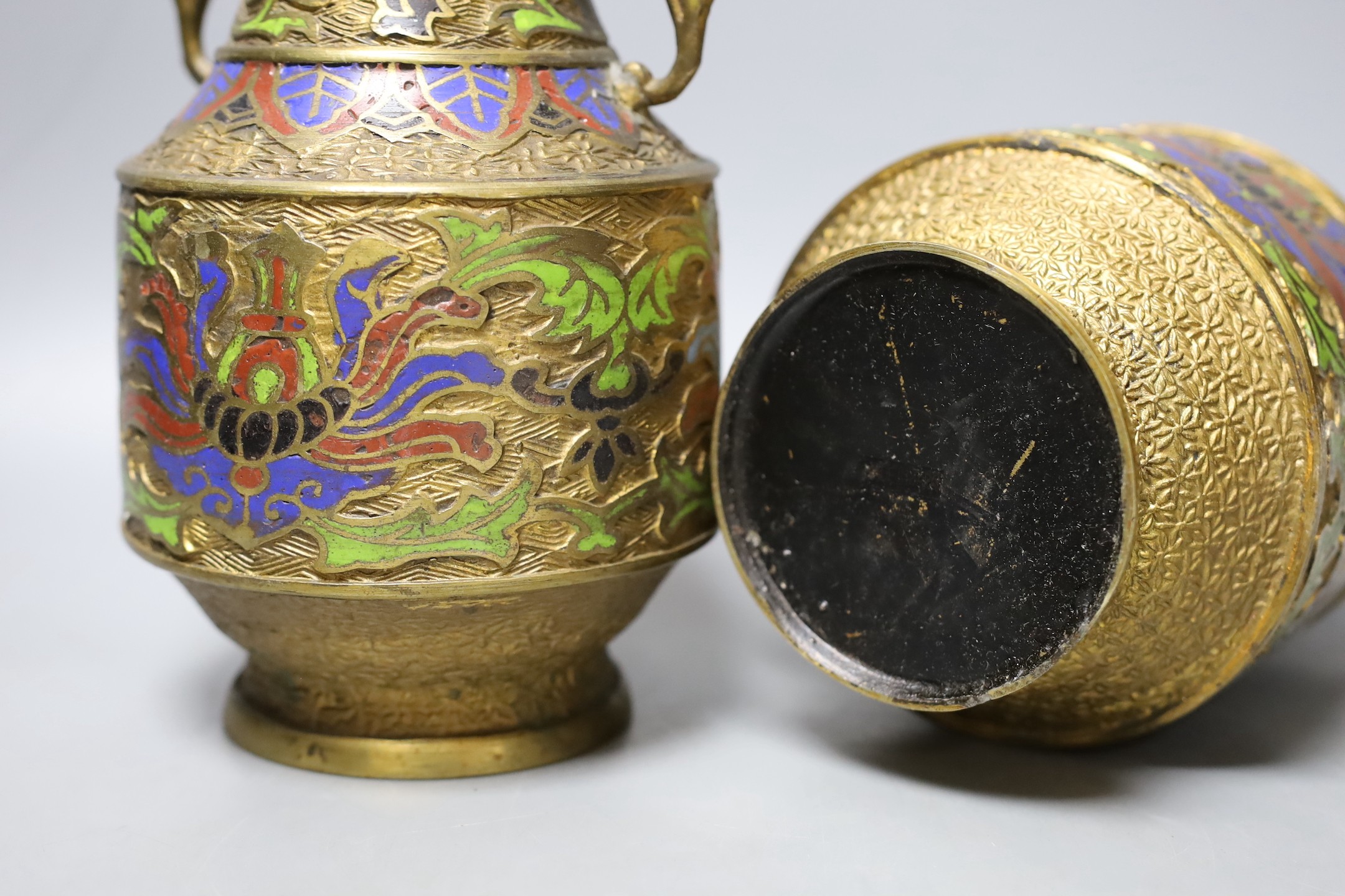 A pair of Japanese champleve enamel vases, a Canton enamel teapot, a jade archers thumb ring (6)